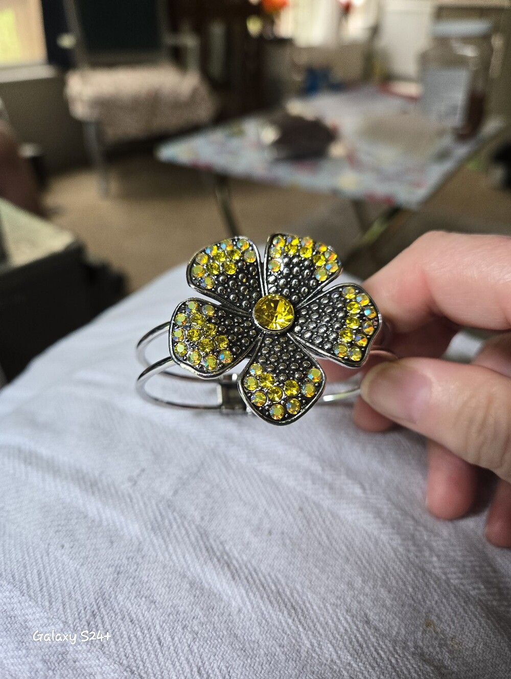 Paparazzi Accessories "Bedazzled Bloom" yellow hinged bracelet .The Paparazzi